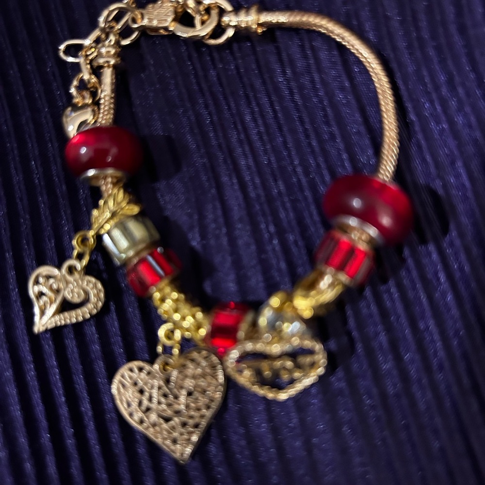 Elegant Gold and Red Charm Bracelet